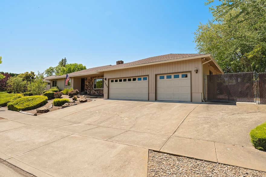 Beautifully Maintained E Medford home in Highly Desirable neighborhood. Move in ready 3 bed 2 bath single level home, close to schools & Asante Medical. professionally landscaped W/private all fenced back yard plus large Gated RV parking & 3 car garage. Two Beautiful Private Backyard Patios off Kitchen & one that is shared off Living room & Large Primary suite. Rock fireplace in separate living room. wood stove in Family room. Kitchen/dining room is center of attention off living room and family room. Kitchen has beautiful hardwood flooring