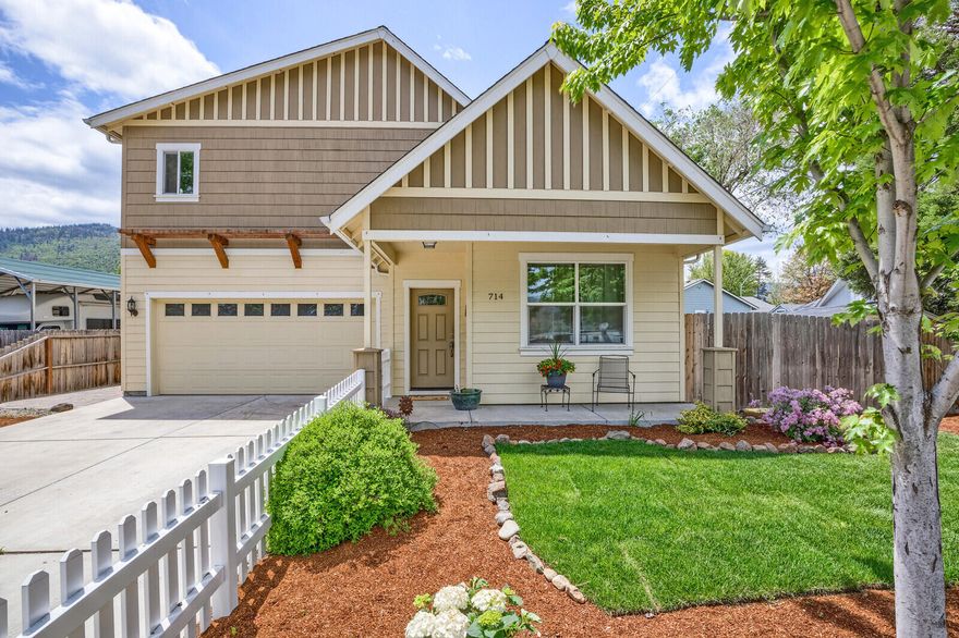 Wonderful home in the heart of Talent, featuring a bright and open floor plan with a custom fireplace, 9' ceilings, granite counters, hickory floors, and indoor/outdoor living. The main level primary bedroom has an ensuite bath and walk-in closet. The primary opens to a lovely backyard with a custom patio and organic garden beds. The main level also has a second bedroom and full bathroom. The second-floor oversized bedroom could be used as a great home office, exercise room, or art studio. The upstairs room also features a mini-split HVAC for more flexibility with climate control. The backyard is large, private, and has room for entertaining and gardening with custom raised beds and Talent Irrigation District water. There is even a designer chicken coop! The home is Eco-conscious with an EarthAdvantage Platinum rating. Located close to downtown Talent with the park only one block away (including beautiful walking paths, dog park, tennis, pickleball, and more). Don't miss this one!