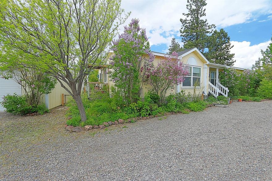 Birder's Paradise! Just under 1/2 acre of country living near Klamath and Agency Lakes. Back Yard Oasis includes Thorn Free Raspberries, and functional hot tub nestled in the garden. The home includes a 24 x 36 2 car garage and shop building with additional storage.