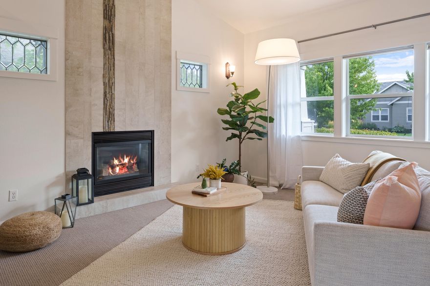 This single-level home in Redmond's premier NW neighborhood sits on a picturesque tree-lined street with mature landscaping & wide front porch inviting you in. Inside, vaulted ceilings and an open layout create a bright and welcoming living space. The kitchen and dining area feature custom tile flooring with stone inlay, while the living room showcases a floor-to-ceiling stone fireplace and built-in entertainment wall. The spacious primary suite offers a walk-in closet and a beautifully appointed bath w/ granite counters, double sinks, radiant floor heat, and bidet. The private fenced backyard is perfect for gatherings with a concrete patio under the custom pergola and café lights. Recent updates in August 2025 bring peace of mind: new roof, A/C, and fresh interior and exterior paint, plus a newer furnace in 2022. Located in Canyon Rim Village w/ low HOA fees, playground, paved trail access to Dry Canyon, and a block from the new Dry Canyon Club w/ coffee, tap house, and food trucks.