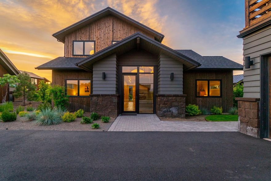 Your search for the perfect vacation home in Bend ends here, at Trailhead in Tetherow. Situated near the resort's amenities and just steps away from Central Oregon's finest trails, this fully furnished vacation home is not only a place to relax but also an income-generating property. Immerse yourself in the vibrant Tetherow lifestyle, where adventure awaits right outside your door. Start your day on the renowned Phil's Trail, hit the slopes at Mt Bachelor, go white water kayaking on the Deschutes River, indulge in a swim and soak at Tetherow Sport, or enjoy a world-class golf game. This turn-key home boasts sleek and custom finishes, offering both style and flexibility. It comprises a main home with reverse living, featuring four well-appointed king suites, as well as a luxurious 369 sq ft ADU. Outside, a spacious patio with a firepit and hot tub, providing the perfect setting for relaxation. This home is ready to seamlessly provide luxury and convenience for your next getaway.