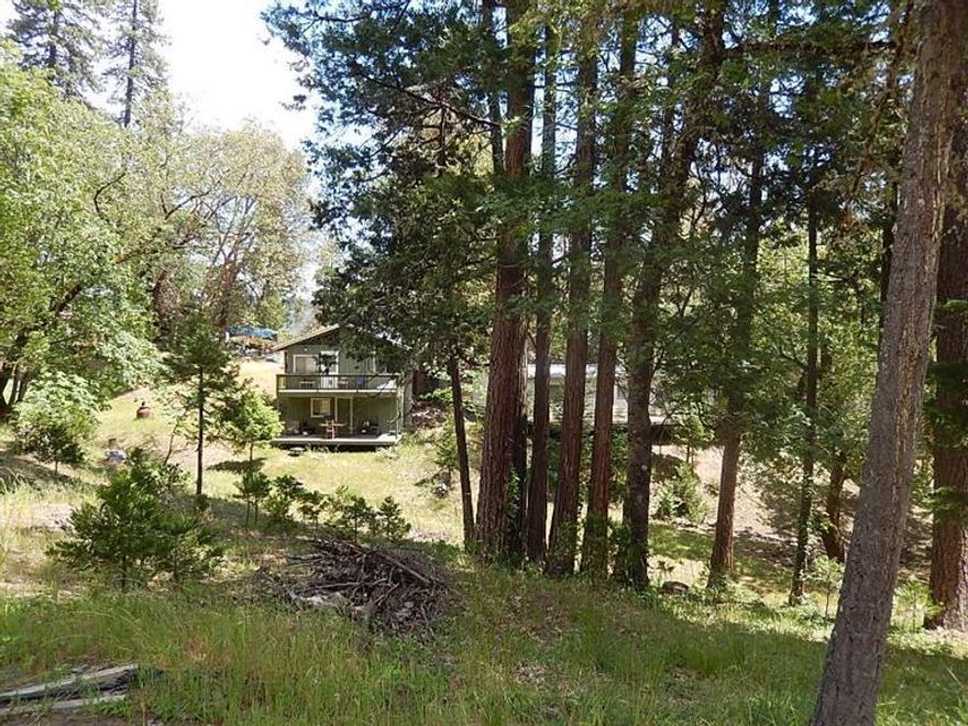 Do you have a DREAM of owning a rural property that may allow you to set up a Family Compound with multiple homes? This is the only one I have run across in nearly 20 years of selling Real Estate!! Unique Historical Property. Once originally known as Holcomb Mineral Springs Resort. Numerous dwelling units & cabins grandfathered on this property. Most are in need of major renovation & repair. Nearly 40 acres of wooded property packed with multiple trails for riding or hiking. Holcomb Mineral Springs is written about in the Oregon Metal Mines Handbook'' in 1940 saying ...it's the only mineral springs in the Gold Hill mining district.'' There are 35 acres packed with mixed cedar, pine, fir, oak, maple, madrone & manzanita. Property has a tree farm status for lower property taxes. Large clearing near top of property offers a 180 degree view of Sams Valley, Table Rocks, White City, Mt McLoughlan & Mt Ashland. End of road privacy & seclusion. Over mile borders BLM forest lands.