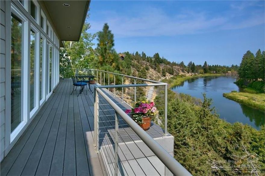 Outstanding panoramic views of the Deschutes River from every room. This home has it all with direct access to the Deschutes River Trail just 1 mile from downtown! Spacious open-plan living/dining, media room, and chef's kitchen with granite countertops and high-end appliances. Enjoy the views, an active lifestyle and your own slice of paradise from 2 master BR and 2 large balconies. A study serves as a potential 3rd bedroom with ideal bedroom separation.