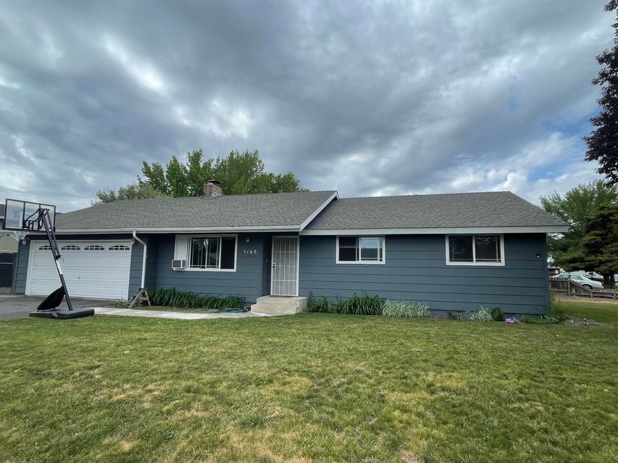 Wonderful Gatewood home on a large corner lot with lots of parking! This super cute home has plenty of RV parking as well as mature fruit trees and underground sprinklers, the inside has newer flooring throughout the home and newer appliances in this large galley kitchen, there is a really nice loft style family room upstairs, come make this wonderful home your own. 
The carport and the barn tin on top of the fence is not included in the sale.
Directions: from sixth Street go south on Homedale turn right onto Bartlett left onto Gatewood Drive right onto Laurelwood your home will be on the corner of Laurelwood and Knightwood