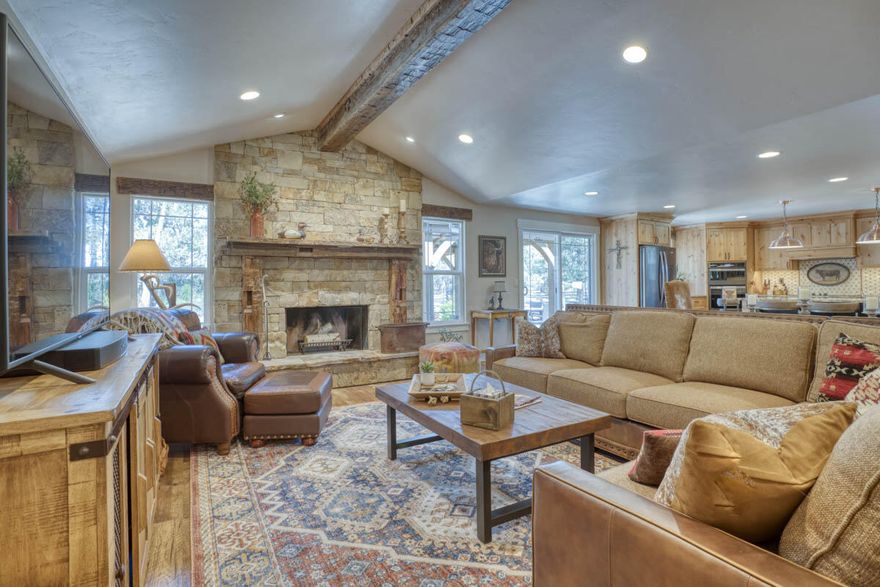 This exquisitely renovated single level home and horse property offers top shelf country living just minutes west of Redmond. The custom renovation includes a stunning great room that opens to a covered outdoor kitchen and entertaining space, 2 primary suites, guest bedroom and bath, plus a home office. 24 x 30 fully insulated shop w/ additional 14 x 24 tool room, loft, 3 roll up doors and 30 amp service for RV's. RV and horse trailer parking and access. Property is irrigated, fenced, cross fenced with 2 animal stalls and corral. Horses? Ride out from the property to the Dry Canyon! Bring all of your people, animals, and toys and enjoy the Central Oregon Lifestyle!