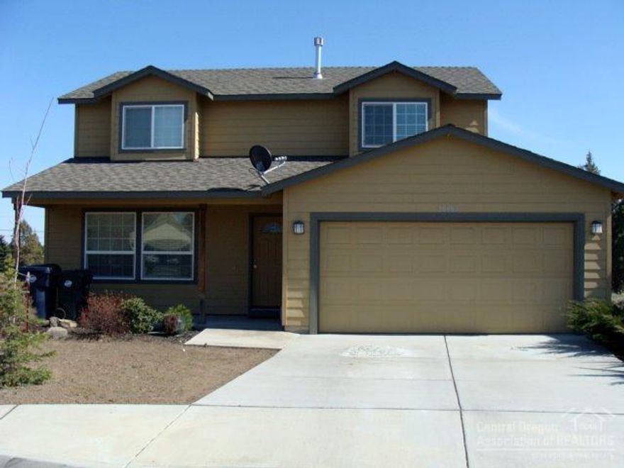 Convenient NE location. Home is located on cul-de-sac street & backs to canal & walking path. Nice floor plan with tile entry, linen closets in each bathroom, plus 1/2 bath down. Dining nook, breakfast bar & formal dining area. Vaulted master suite has double sinks, window seat & walk-in closet. Gas forced air heating.