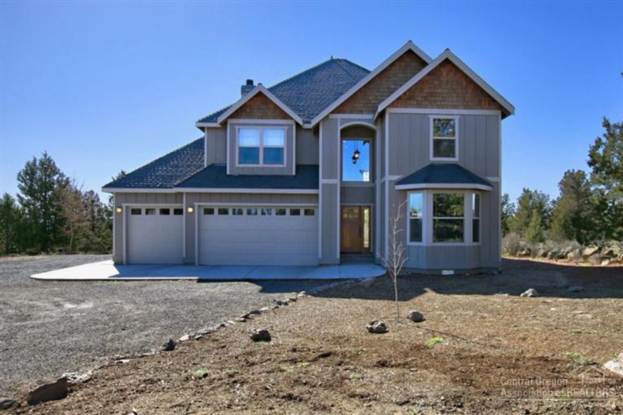 This 2903 sqft home has 4 bedrooms, 2.5 bathrooms, bonus/family room and office. Hickory floors, cherry cabinets, stainless appliances and pantry create a beautifully functional kitchen. Master bedroom has jetted tub and tiled shower. Hammered copper sinks, large walk-in closet, and private deck. Upgraded fixtures throughout. Dramatic fireplace in living room. Covered patio. 3 car garage. 3 stall Barn w/ tack room. Fenced horse arena. All outbuildings included.