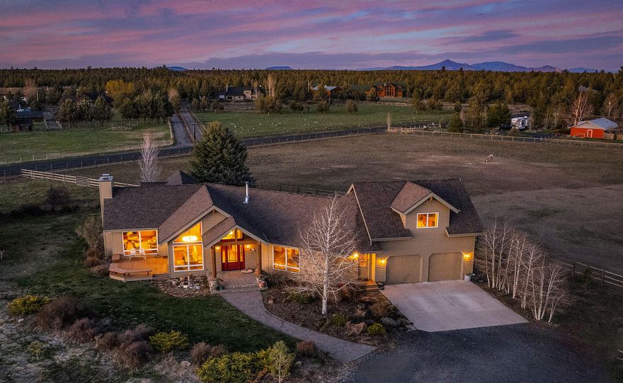 This exceptional property features a spacious 4,061 sq. ft. home that is meticulously updated. As you step inside, you are greeted by ample natural light streaming through expansive windows with beautiful views. The kitchen is well equipped with high-quality appliances, gas cooktop, warming drawer, huge pantry, granite counter tops, and a large central island. The great room has a fireplace and log accents throughout. There is a bonus room on the main floor and a second bonus room/office upstairs that could also be a fourth bedroom. The main floor primary bedroom features french doors onto a private deck and a large master bathroom with a soaking tub. Situated on 10 acres with 5 acres of irrigation, fenced and cross fenced, with a gated entry. There is a fantastic horse barn with custom light fixtures and a charming tack room, stalls and acces to trails. Finally, there is an insulated shop and a small detached office/studio. Don't miss this outstanding property!