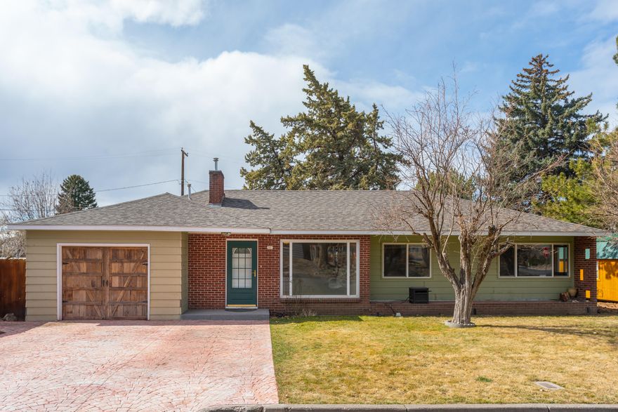 Do you want a classy home in a great location? Close to hospital, parks, 
Madras Aquatic Center, Schools, and Trails. Hardwood Floors, large over a quarter acre lot. Central Air with gas heat. Great, Private, fenced backyard, nice stamped concrete driveway. Sprinkler system front and rear! Two storage sheds and a great detached hobby shop. Great fenced in and protected yard for pets. Be sure to add this home to the Madras Tour. Call your favorite Realtor today to schedule showing,