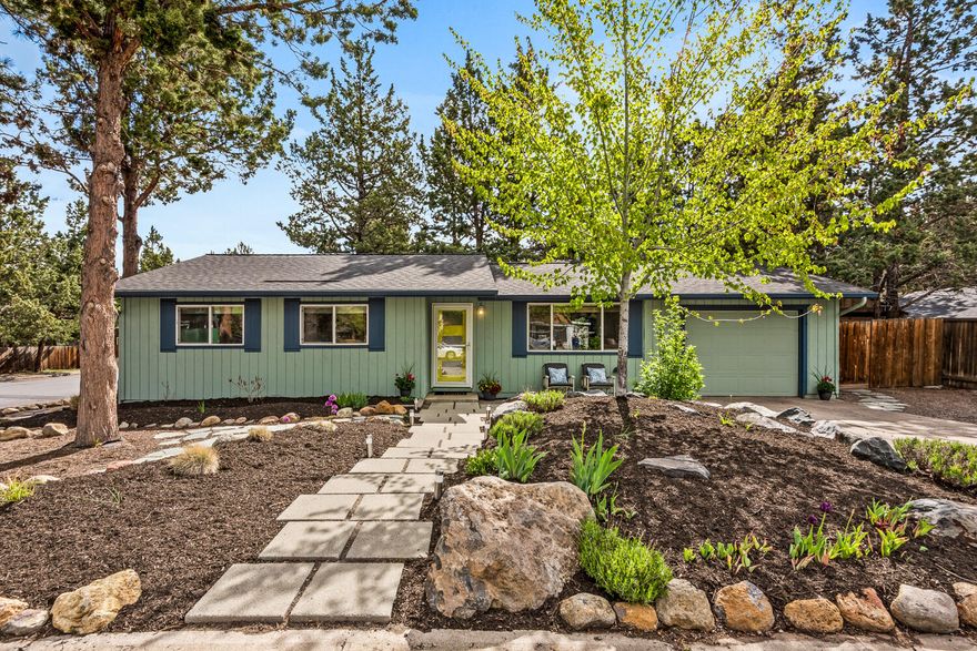 Situated on a desirable corner lot, this beautifully updated three-bedroom, one-bath single-level home offers modern upgrades, quality finishes and move-in ready convenience. The home features a new roof and a luxurious, newly remodeled bathroom featuring a new vanity, mirror, tile work, bathtub and window. Step into the bright galley kitchen equipped with newer stainless-steel appliances, where natural light enhances the efficient layout. The inviting living space includes a cozy wood stove, ceiling fan and updated vinyl windows ensuring year-round comfort and energy efficiency. Step outside to enjoy the private deck and patio area with a built-in rock fire pit, perfect for entertaining or relaxing evenings under the stars. The yard is both beautiful and low maintenance with xeriscaping, automatic sprinklers and drip irrigation. Bonus RV parking. This home is ideally located just two blocks from Kiwanis Park and is close to shopping, schools, and other everyday amenities.