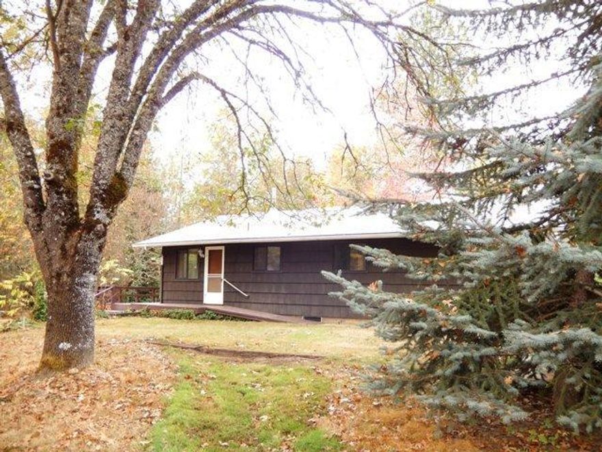 Its time to sell Dad's house. Son just had a whole house inspection and it needs some work. It will not qualify for an FHA or VA loan mostly because there isn't enough clearance under part of the house and electrical issues. But it does have some very nice qualities. The home is over 1600 sq ft with 6.21 acres and a small studio apartment with a older 24 by 30 shop. There are three wells but only one is registered at 16 gallons per min. The roof is only three years old and several thousand dollars of understructure has been completed. Call the listing agent for a copy of the home inspection and the repairs completed.