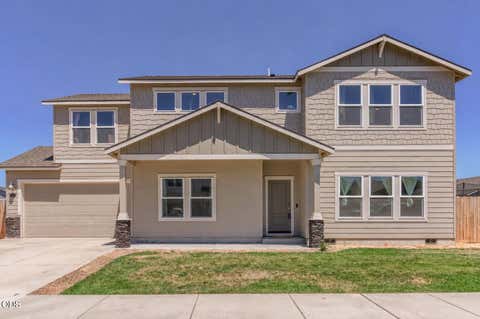 Photo of 300 NW Double Eagle Avenue, Madras, OR 97741 (MLS # 220223359)