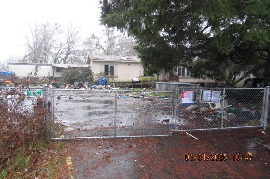 1.27 acre dual  lot offering in Grants Pass.  Property comprises 2 RR% zoned lots.  Lot 1 cover a full acre, Lot 2 is 0.27 acres.  Situated in a tranquil setting yet minutes from downtown Grants pass.