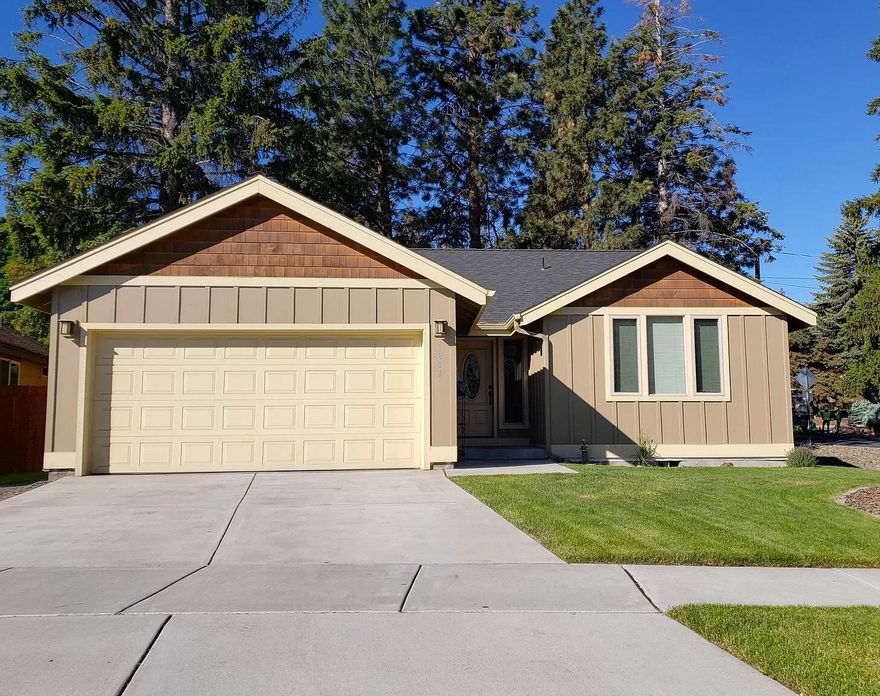 This single 3-bedroom 2 bath home is centrally located. It is close to shopping, restaurants, and all the conveniences of Bend. The kitchen has granite countertops, hardwood floors, a spacious pantry and beautiful hickory wood cabinets, doors and trim throughout the home. With a double car garage and a fenced backyard this home is all you need for comfort and easy living. This would make an amazing family home or a very fruitful investment property. Close to Hollinshead Park. Park amenities include an unfenced, off-leash dog park, community and demonstration garden, a walking trail through preserved nature area, and space for picnicking. Much of the park is open fields in place of the original orchard.