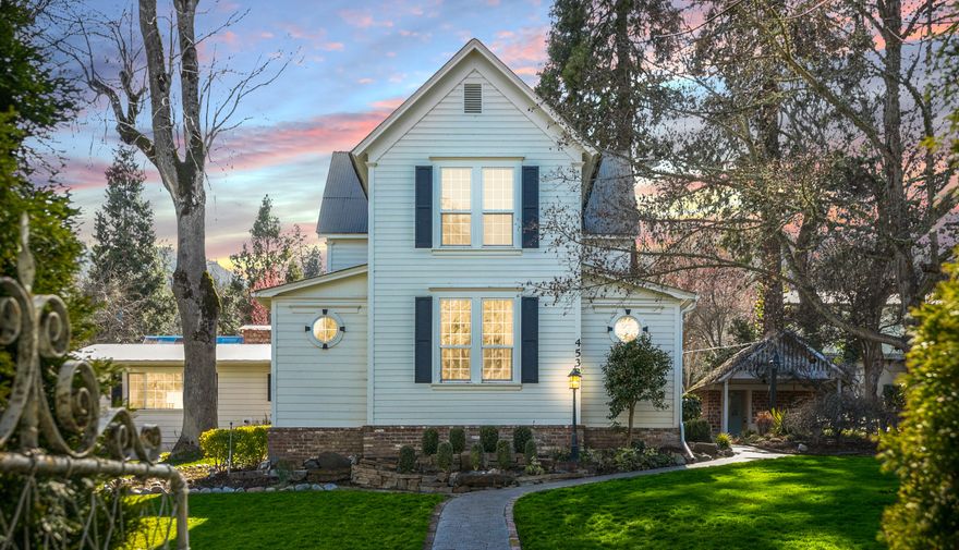 An enchanting historic treasure nestled in picturesque landscape, this captivating property boasts a blend of timeless charm and modern updates. The heart of the estate is a beautifully renovated farmhouse, the area's oldest stick-built home, thoughtfully remodeled for style and convenience. Entertaining is effortless. Inviting patios and covered spaces beckon you to relax in nature, host intimate gatherings or large get-togethers and create cherished memories. Buildings to accommodate all your needs: ADU with privacy for guests (not permitted living space), office, workshop, insulated RV garage w/hookups, and other versatile outbuildings. Too many recent improvements to mention, but check out the new 2800 sq. ft. pavilion, new flooring and HVAC systems, plus extensive landscaping upgrades. The ideal retreat to escape the bustle of life and a rare opportunity to own a piece of the past while embracing modern comfort.