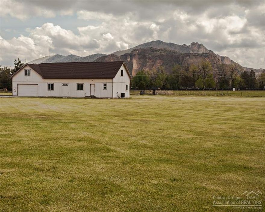 This must see, Beautifully maintained property w/irrigation, pasture, and large lawn is move in ready. Plenty of room to build your dream barn/shop & would make an excellent horse property. The location is just minutes from town & even closer to the famous Smith Rock State Park. Watch the rock climbers from your front window & the beautiful farm land across the street. This is the type of property you love & wished you owned on that Sunday driveby. The very comfortable home is awaiting your finishing touch.