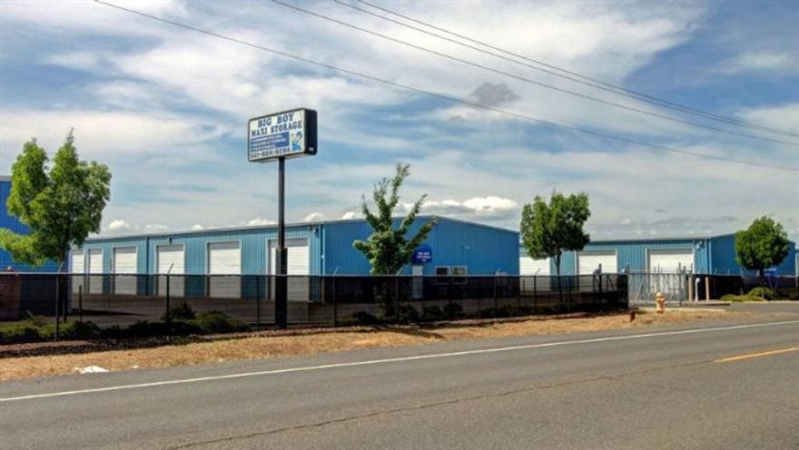 Large storage needs? Big Boy is a low risk proven investment for the savvy investor designed to cater to clients with much larger storage needs many of which are luxury motor coaches. This property has led the way with innovation as a flagship storage facility in the Rogue Valley with increased profits year over year. There is 52,100 sq. ft. of total enclosed storage built in 2005. There are a total of 75 enclosed units to rent in various sizes of which the smallest is 12 x 20 and the largest is 24 x 65. There is an additional 20,280 sq.ft. of covered parking that is comprised of 26 lanes that are 65' long and can be divided up as needed. There are additional outside uncovered spaces (estimated at $16,800.00 annually) on a lighted paved area. Currently at 100% occupancy. This 4.48 acre is now completely developed. 24hr access with coded entry and security cameras that can be monitored off site.