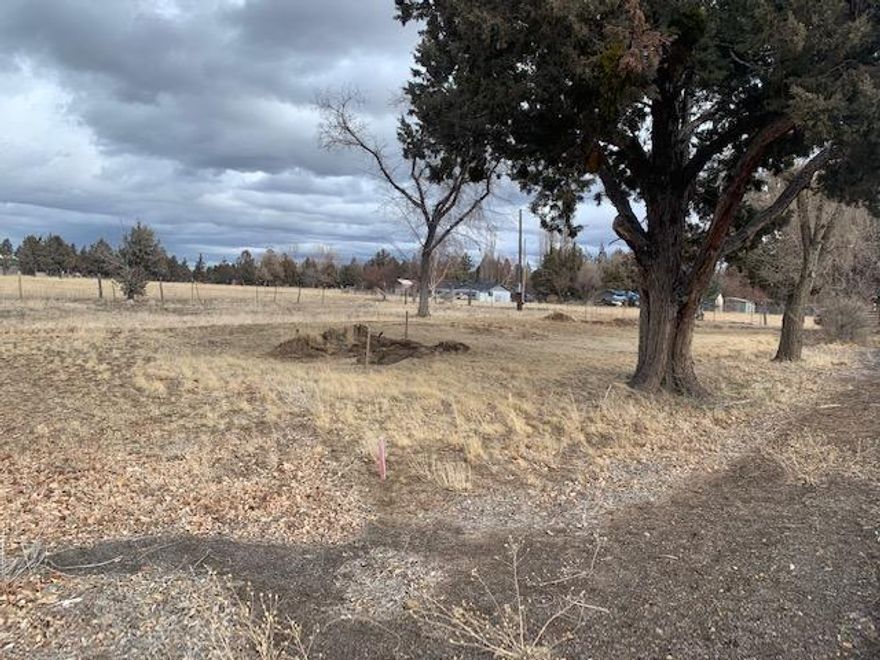 Build Your New Home On This Nice Flat Half Acre Lot Or Bring Your Manufactured Home.  There Is Already Power & Avion Water On The Property. Great Location, Just Across The Street From Pine Nursery Park With Trails, Athletic Fields, Fishing, Volley Ball, Pickle Ball Courts,  & Dog Park. Approval For ATT Septic System Completed.