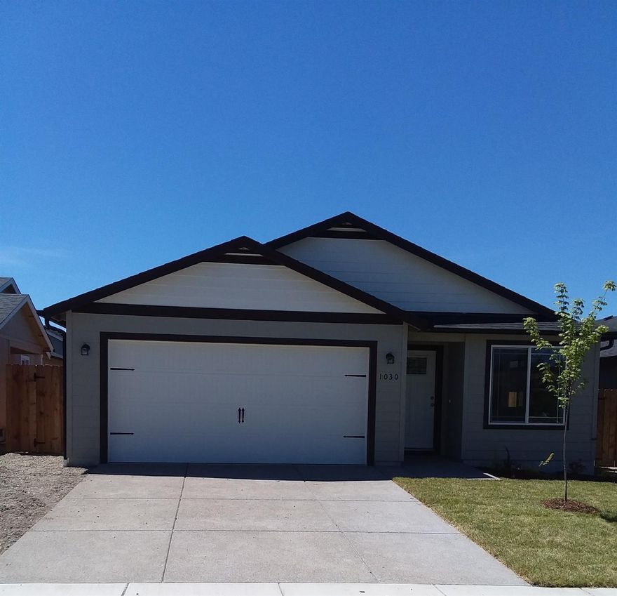 Brand new construction within Cherry Meadows subdivision is conveniently located close to downtown Medford, shopping and schools. This 1350 sqft home is 3 bedrooms and 2 baths with laminate wood flooring, cedar fencing and equipped with front and backyard irrigation and landscaping. The kitchen features custom cabinets, granite counters, vaulted ceilings and stainless steel appliances. The master bedroom also has vaulted ceilings and a must see giant walk in closet. The 2 car garage is finished and painted. Seller is licensed real estate broker in the state of Oregon