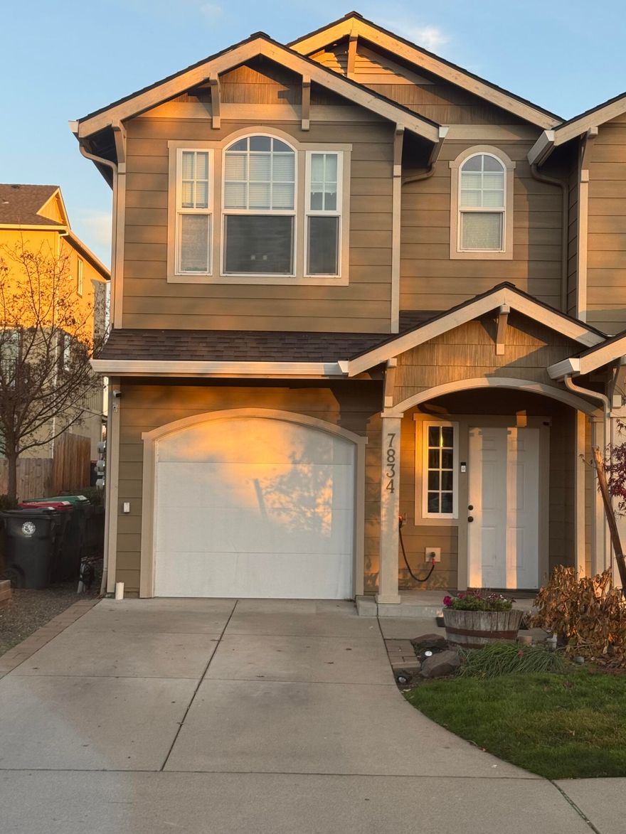 This Beautiful end unit townhome is move in ready!! The spacious open floor plan offers over 1525 SF with 3 bedrooms and 2.5 bathrooms. Newer flooring installed downstairs and refreshed paint throughout the home. Downstairs bathroom has a cute barn board feature wall, while the upstairs main bathroom was fully remodeled in 2023 with custom countertop and vinyl tile. The master bedroom has two large closets and double vanity sinks. Laundry is located upstairs along with an oversized linen closet. The slider leads to a fully paved and fenced backyard oasis with raised garden beds. Side yard completely graveled and partially fenced with potential room for a storage shed. HOA covers water, sewer and front yard landscaping. Sale includes remaining transferable home warranty and carpet credit