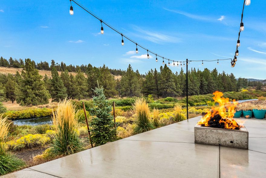 Extraordinary custom built 2836 square feet luxury home along the banks of the Deschutes River in Tumalo Oregon. This incredible private gated estate sits on .88 acres and backs up to state park property with full exposure and access to the Deschutes River and a trail to Tumalo State Park. The large kitchen offers an abundance of storage along with the pantry & wine cooler. The living, dining and kitchen look out over the Deschutes River and patio with propane fire pit, a perfect place for entertaining. The main level primary bedroom has a custom closet system and a luxurious bathroom. The views from the house of the Deschutes River are exceptional. Come experience the unlimited possibilities of river front living.