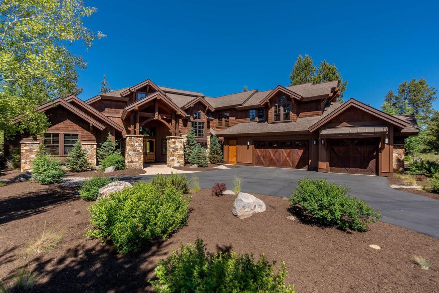 Beautiful NW design by Pineriver Homes that received Best of Show awards in the Tour of Homes. Located on .41-acre lot. When you enter the home, you will appreciate the attention to detail. Vaulted great rm w/wall of windows, wood ceilings, 8'' plank hickory hardwood throughout main level, floor to ceiling stone fireplace & entertainment center. Dining area features, buffet w/wine refrigerator. Every cook's dream kitchen w/island & walk in pantry. Wolf 6 burner gas stove, S/S appl. Granite slab counters w/chiseled edge, knotty alder raised panel cabinets & farmhouse copper sink. There are 3 primary suites, one on the main level. All the bathrooms have Travertine flooring, granite counter tops & tiled showers. 2nd bedroom/family rm on the main level. Large bonus room. Paver patio w/gas fire pit & BBQ. Utility rm w/cabinets & bench. 3-car garage w/epoxy floors. Enjoy golf, bike/walking trails, fitness center, tennis ct. & pool. Paddle board/kayak/canoe or go fishing at the private lakes.