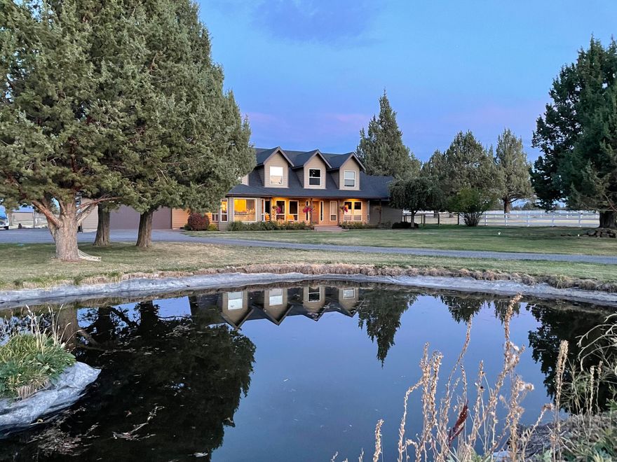 A beautiful, peaceful, quiet horse property with Cascade Mountain Views. If this is what you want to call home, this could be your dream come true! Situated on over 10 acres with 4.25 acres of irrigation this 2-story home features a master on the main floor with a walk-in closet, wood floors, cozy woodstove in the family room, hot tub, expansive backyard deck, and new heat pump and furnace in 2020. Home also has an attached garage, large shop with RV garage door, and greenhouse. Property includes a loafing shed, chicken coop, animal shelters, and fenced garden/orchard. The pastures are fenced and cross-fenced. Sit on the front porch looking out over your pastures, 2 ponds and mountain views! Property borders Parks and Recreation Land.  Bike riding, horse-back riding, taking your dog on the trails, or hiking could be accessed right from your property!