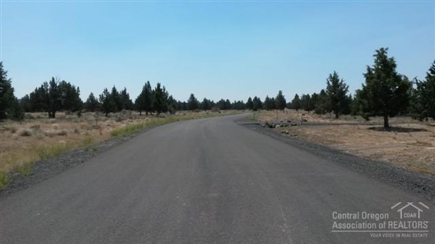 Very private parcel in Falcon Ridge subdivision. Level building sites, paved road, underground utilities, and water provided from completed shared well. Possible Cascade views from a second story. Plenty of room for your horses on this 4.75 acre parcel. A great place to build your new home while taking advantage of Central Oregon's wide variety of recreational possibilities. Only minutes to Prineville Reservoir and a short distance to downtown Prineville.