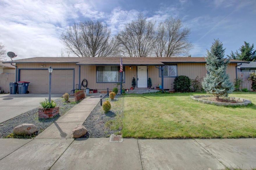 Quaint one story home with an open floor plan with large living room, dining room and galley kitchen. Three bedrooms and two baths all on one level make for comfortable living. The large backyard is fully fenced and you can sit on your covered patio and relax when the weather is hot. The two-car garage offers plenty of room for your toys and there is also a shed for your tools in the backyard. All this and convenient to shopping and schools and all under $200k.