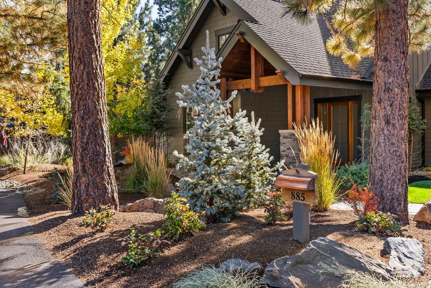 Experience refined single-level mountain living just minutes from downtown Sisters in this impeccably designed three-bedroom home bordering public land. Soaring 10' ceilings with wood beams, 8' solid doors, and a striking 17' stone fireplace define the open great room. The chef's kitchen highlights a Bosch induction range, butler's pantry, and bar with wine and beverage coolers. Premium finishes include engineered hardwoods, solid-surface counters, porcelain tile, and custom cabinetry. Comfort and sustainability meet with a Mitsubishi Hyperheat system, ERV ventilation, and Earth Advantage Platinum certification. Outdoor living offers a landscaped yard, pergola with retractable canopy, in-ground Hot Springs spa, firepit, and paver patios. A heated oversized garage, attic lift, EV wiring, and six-camera security system complete this exceptional retreat uniting luxury, performance, and serenity.