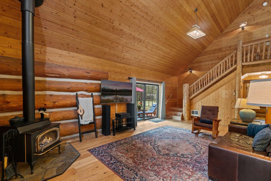 This distinctive Oregon Water Wonderland home is filled with artistic flourishes and rustic touches that enhance its connection with this remarkable neighborhood that provides access to the Deschutes River & is just minutes from the endless National Forest land just beyond the neighborhood. Enjoy cool summer days on the wrap around deck & cozy evenings in the spacious great room with towering wood lined ceilings. A roomy kitchen includes a generous expanse of granite counters with tile backsplash & stainless steel appliances. A large open loft adds plenty of extra living space & leads to a light-filled primary suite with wood lined vaulted ceilings, walk-in closet & bathroom with separate tub & tile shower. On over half an acre, this property is fully fenced with 2 gated entries & a large garage/shop, ready for all your projects. Immersed in the beauty of Central Oregon, this home is perfect for seasonal or year-round living, just 6 miles to Sunriver and 24 miles to Mt. Bachelor.