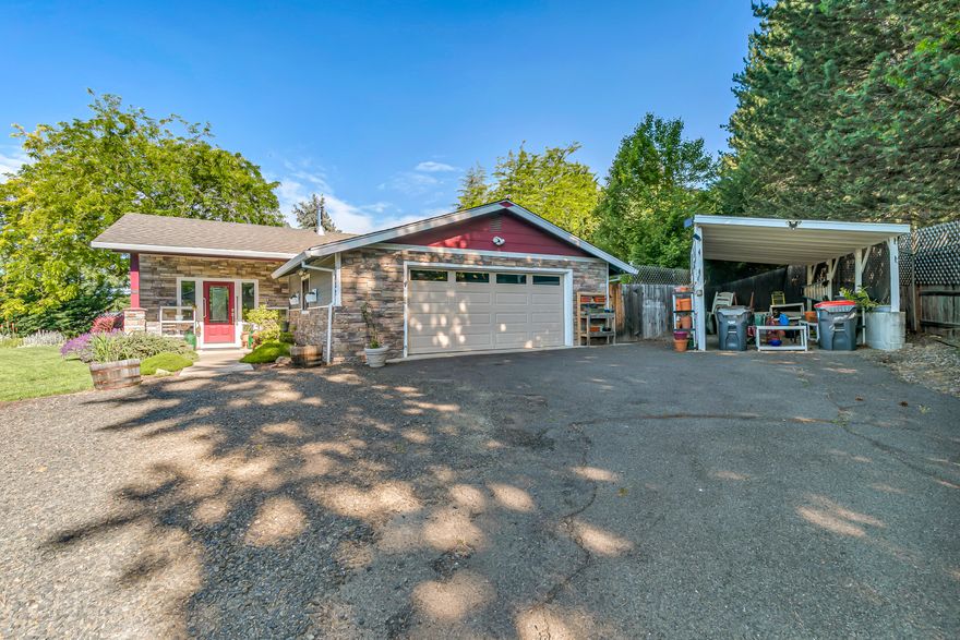 Hard to find, 4 bedroom 3 full baths plus office, home in East Medford. Tile entry, beautiful maple floors, great room with speakers wired in the ceiling, ceiling fan, and certified Blaze King wood stove. The dining area has French doors out to the deck and is convenient to the kitchen that boasts hickory cabinets and pantry with pull-outs, granite counters and tile floors. The primary suite has a walk-in closet, jetted tub, and cultured marble counters with double sinks. There are three other bedrooms (one with ensuite bathroom) and a third full bathroom.  Cabinets line the hall and there are upper cabinets in the utility room. The landscaped back yard is a great place for barbecuing and entertaining.  Situated on a secluded .45 acre flag lot in a desirable established neighborhood.