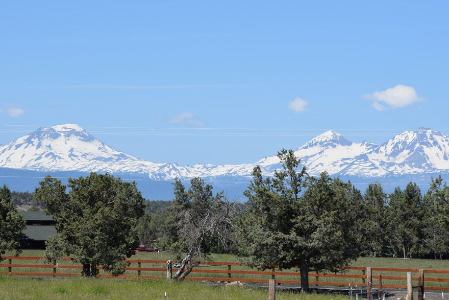 Bring Offers, price reduced $50,000! Great opportunity to own a stunning irrigated panoramic view property that includes a huge 5,184sq ft shop w/over $300k in HVAC, & electrical upgrades! Property features absolutely gorgeous Cascade mountain, Powell Butte, & lush pasture views! Already approved home site & standard septic system & homesite has a separate power panel installed. A high producing private well & newer well house w/pressure tank included. The shop has been partitioned in several rooms that can easily be reconfigured to cater to individual uses. It includes; concrete floors, commercial 3 phase power, top of the line individually zoned HVAC systems w/heating & cooling, security system, & roll up door. The pasture is irrigated w/COID irrigation & includes a 1.5hp pump. Great SW location is minutes from town w/easy access to Bend & Hwy 126, & only 1,600ft from the Deschutes River. Plans for a 2,846sq ft single level home w/open floor plan included!