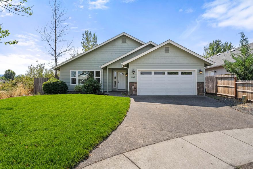 Move-in Ready in Grants Pass! Welcome to 1149 SW Sturgeon Ct - a beautifully refreshed 3 bedroom, 2 bath home offering 1,503 sq. ft. of comfortable living. Bright and airy with an open floorplan, this home shines with new interior paint, new luxury vinyl plank flooring, and plush carpet in the bedrooms. The kitchen has been tastefully updated with refinished cabinets, new countertops, and brand-new appliances. Both bathrooms feel like new with refinished vanities, fresh tub/shower inserts, and new toilets. Stay comfortable year-round with a new heat pump. Perfectly blending style and function, this home is truly move-in ready and waiting for you!