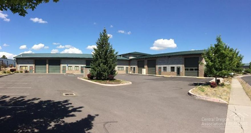 Rare opportunity, first time on market. Custom built by owner, 12,950 SF Industrial building in popular N. Brinson Bus. Park. Currently owner user with 3 years left on lease. May be demised into 4+ spaces. Additional 1100 SF office mezz with Mt. views, not included in total footprint. Fire sprinklers. Built-up concrete slab to accommodate heavy machinery. Six rest rooms. 23 parking spaces. Too many amenities to list!