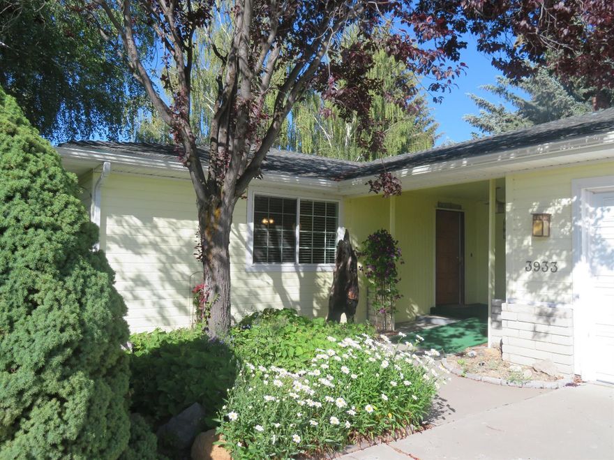 Very established trees & garden (w underground sprinklers) make this Sunset home feel very private and woodsy! 3 bd, 2 bath, one with huge walk in tiled shower. Oversized kitchen/family, dining area off back yard patio. Spacious separate living room would be awesome media room, home theatre. Large laundry room for everything! Good size lot with side area, could be rv parking with a little clipping! Newer roof, vinyl windows, ceiling fans and new interior doors. Feels like home!