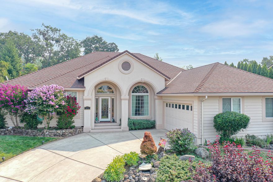 Beautiful single-level home located near Eagle Point Golf Course. Enter this elegant home through the grand entry, with high ceilings and tons of natural light. Perfect for entertaining, the open formal dining, living space and large office welcomes you home. The well-appointed 2305 sqft, split floor plan with a large primary bedroom with walk-in closet, soaking tub, dual vanity and tile shower. Kitchen offers granite countertops, gas range, island, built-in hutch and pantry opens to a nice size family room with gas fireplace. Off the kitchen you will find two additional nice size bedrooms, bath and laundry room. Low maintenance mature landscaping throughout with 2 beautiful water features to enjoy, sloped driveway levels for easy entry to home; private back patio features skylights, ceiling fan and stamped concrete.