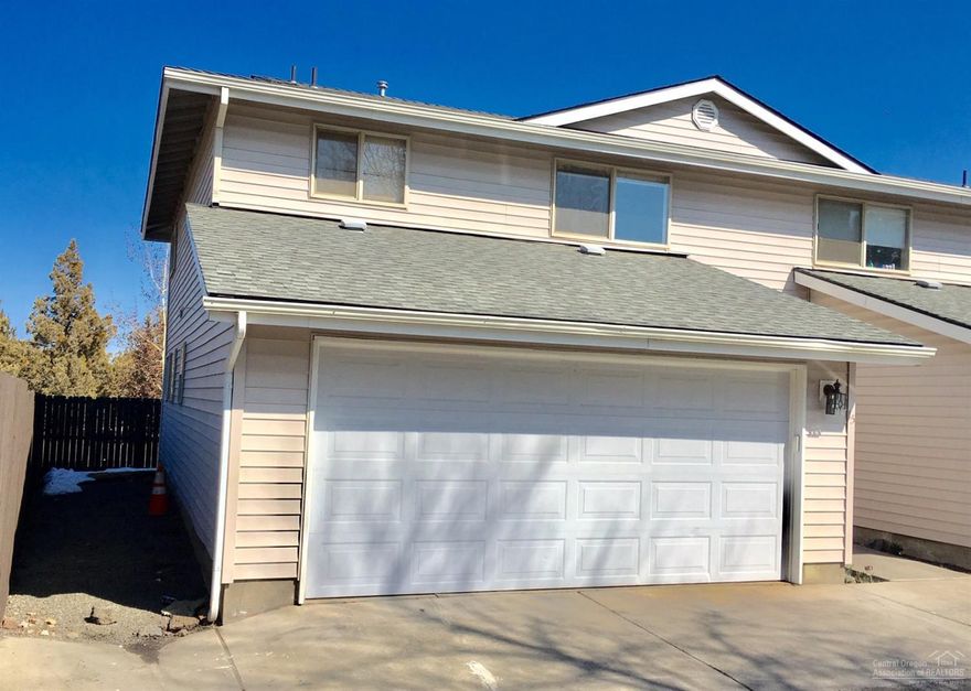 Great NE Bend location across the street from The Center & St Charles Hospital! This condo unit is set back from Purcell Blvd. Open floor plan, two master suites, one with private balcony, walk-in closets. Amenities include seasonal pool & hot tub. HOA covers water, sewer, garbage, snow removal, yard, pool/hot tub & external building maintenance.