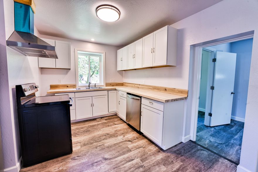 If you are looking for a clean, cozy, and low maintenance home in a desirable neighborhood then look no further. This home has been meticulously updated down to the studs. New electrical system, vinyl windows, insulation, appliances, and energy efficient mini-split HVAC system. The slab foundation means you never have to worry about moisture or pest problems in the crawlspace. This home would make a great investment property or would be great for a small family. The large storage shed is plenty of room to store belongings and tools - or possibly made into a studio. Enjoy old growth Ponderosa Pines and fruit trees in the yard and the new cedar fencing means you'll enjoy it in comfort. Located on a desirable corner lot in a quite neighborhood. The large lot accommodates plenty of parking and has more than 50' of RV space. Short walking distance to the library and downtown Phoenix. Check out the virtual tour or in person!