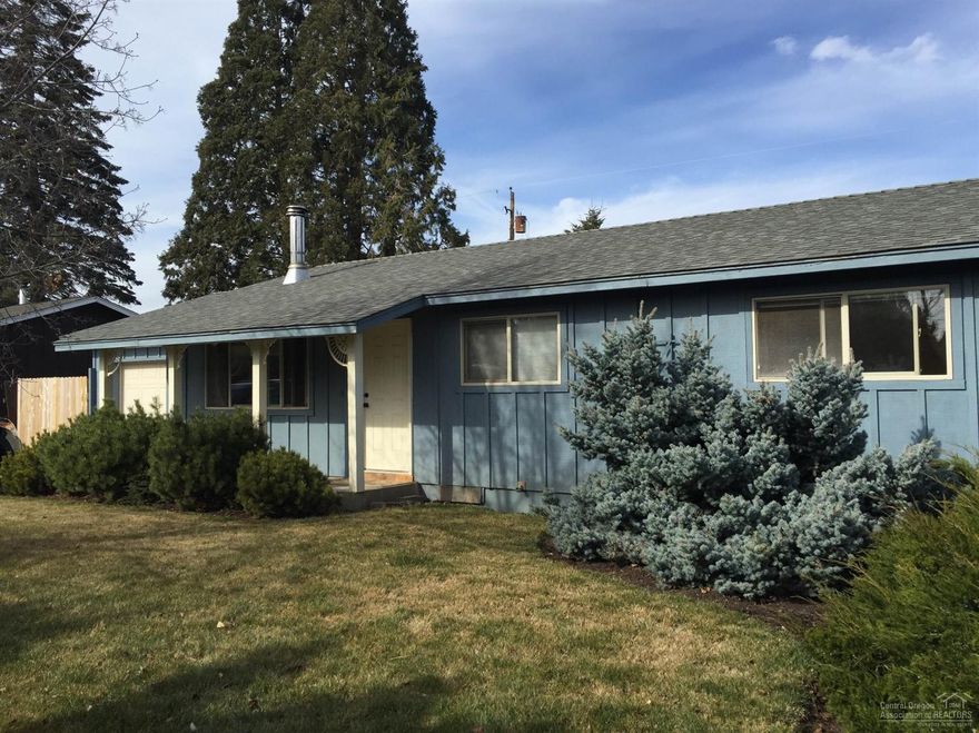 Amazing Midtown single story home with fantastic fenced yard. Home features charming hardwood flooring, wood stove, updated countertops, large landscaped yard with underground sprinkler system, garden, storage shed, patio and more! Perfect home for first time buyer or investor - this home will not last!