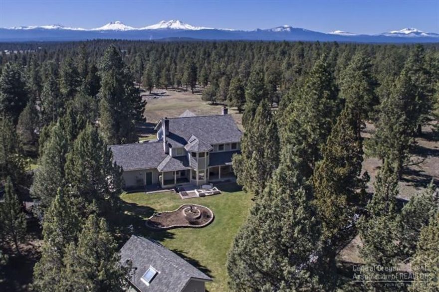 Country living on this peaceful ranch begins with morning coffee and sparkling Cascade Mountain Views from the porch. Ranch home has an attached two car garage, formal dining room and separate breakfast nook for all levels of entertaining. Well maintained 40 acres with pond, adjacent to Public Lands and 1/8 mile from Wychus Canyon Preserve Trailhead. 30X40 shop plus additional 26X30 shop with bonus room upstairs for home office or entertaining. Bring your horses, ATV's or just your hiking boots.