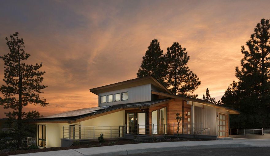 High performance and energy efficient solar home with stunning mountain views in popular North West Bend. Earth Advantage Platinum & Energy Trust Certified home. Brand new custom contemporary home with open floor plan that is designed to easily add a third bedroom. Great room with fireplace and efficient kitchen with European SS appliances and dining area. Great outdoor living with 3 tier decks. Spacious master suite with walk-in closet, Italian tile, cork/tile flooring & private elevator! 98% efficient gas furnace with AC, tank less gas water heater, LED lighting, EV plug & roof top solar system with battery back-up!! Immerse yourself in a low impact & healthy life style with this perfect residence or vacation home.