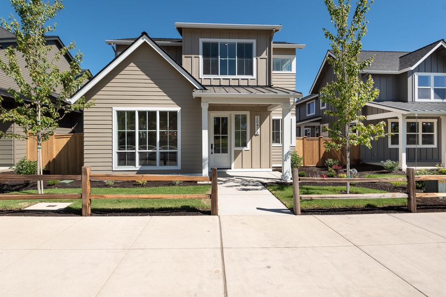 Modern farmhouse style home built by award winning Structure Development NW. Home is located in one of SE Bend's newest neighborhoods, Countryside. Open floor plan featuring great room with gas fireplace and luxury vinyl plank floors throughout main living area. Spacious kitchen with professional series appliances, oversized island and pantry. Custom cabinetry and solid surface quartz countertops. Modern high end lighting and plumbing fixtures. Private primary suite with tile shower and walk-in closet on main level. Large loft, two guest bedrooms and full bathroom on upper level. Covered front porch and side patio for outdoor living and entertaining. Double-car garage and fully landscaped with sprinkler system.