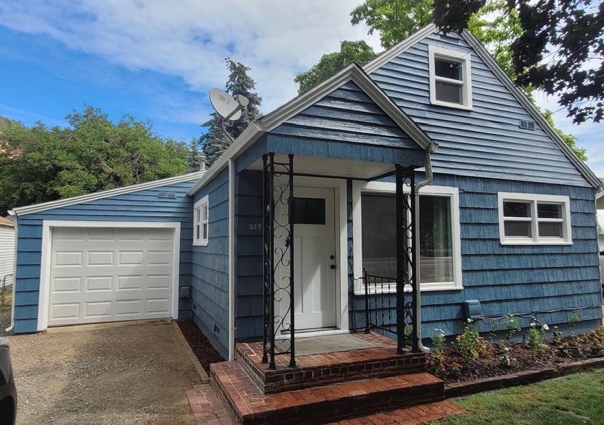 The search is over! This home has been completely updated. Main floor has 2 nice sized carpeted bedrooms with large closets. Main bath is off the kithcen and shared by one of the bedrooms. The half bath seperates the 2 bedrooms and can be easily accessed by guests from the front of the home. NEW AC, Flooring, Exterior and Interior paint, auto garage door, windows, doors. 286 square feet of space upstairs has refinished hardwood floors and plenty of room for a 3rd bathroom in the future.  Outside is charming and  has large walnut, Catalpa and Blue Spruce trees. Love this location. its so easy to walk to everything. 15 minutes to Medford Airport and Costco. The Rogue river is a great place to float or cool off. Del Rio Vineyard is is just minutes away and Punch Tasting Room is about a 7 minure drive. This is the one, schedule a showing today.