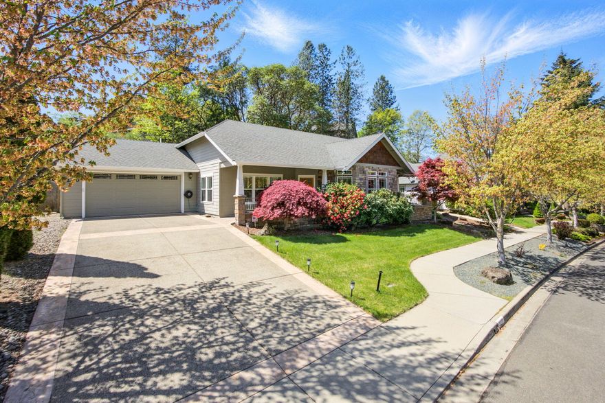 Beautiful single-level 2309 sq ft executive home in prestigious Meadow Wood Estates. This home features an open floor plan that is both comfortable and functional. Large great room that is perfect for entertaining, features hardwood floors, 3 sided glass gas fireplace, breakfast nook and high ceilings. Kitchen features stainless appliances, lots of storage, beautiful granite counters, prep sink and a large breakfast bar. The sunny formal dining room has crown molding, tall coffered ceilings, and wainscoting. The primary suite offers access to a private patio, high ceilings, walk-in closet and a large bathroom with double vanities, shower and jetted soaking tub. Two additional bedrooms one with back patio access, a guest bath and spacious laundry room round out the features. Private backyard has a fire pit, partially covered patio and lawn area for relaxing with friends. Close to shopping and medical.