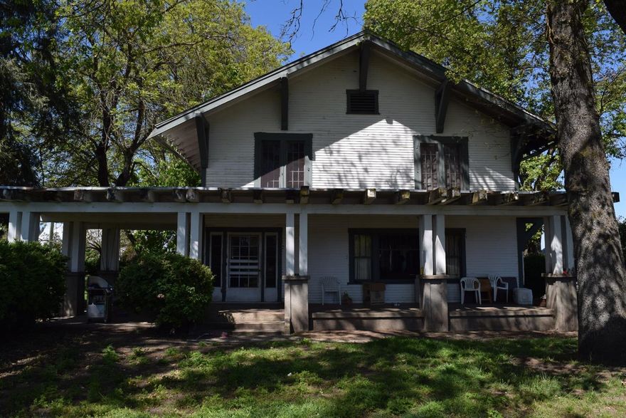 A rare piece of farm land ideally located on the outskirts of Central Point between CP, Medford and Jacksonville with 30 + irrigated acres. The land is currently planted in grass hay, but will also support alfalfa, or maybe a vineyard is in the future for this ideally located farm land. The property consists of 3 separate tax lots, has a large pond, and a creek running through it. There is also a large 4860 square foot barn, and a 1200 square foot metal storage building/shop. There is a 2688 square foot two story original farm house located on the property. It's a craftsman style home with a large front for relaxing and taking in the views.