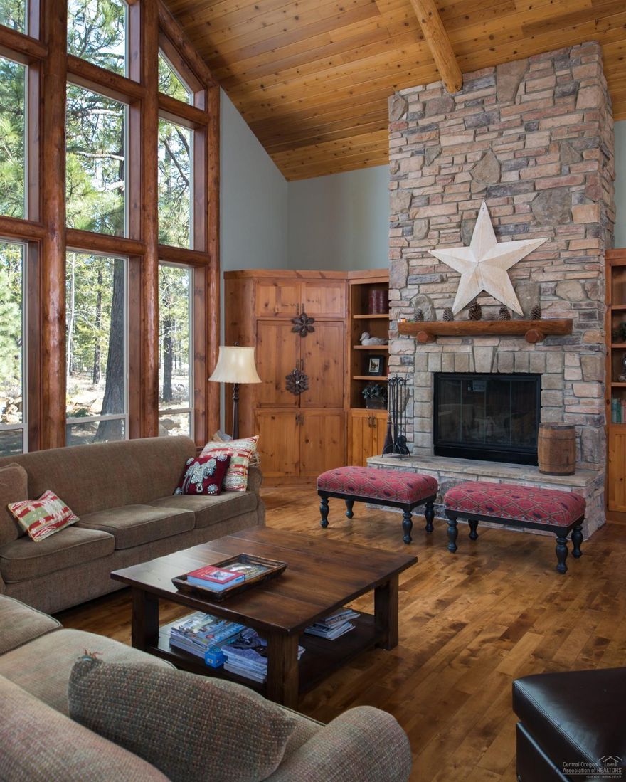 Stunning canvas of wood & stone situated in north end of Sunriver. This lodge style home on 1 1/2 lots has all the lifestyle details essential to upscale living such as a kitchen with stainless steel appliances & custom edged slab granite & cabinets, granite bar area next to over sized spacious deck, great room with its chateau-size fireplace. Main master is separated from other master suites, well proportioned office and family room.