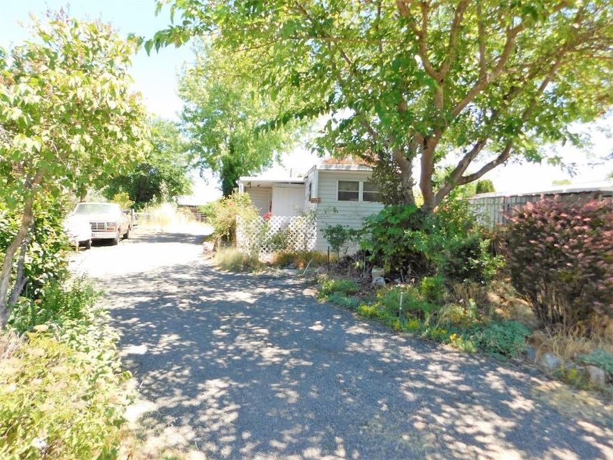 Great cul-de-sac location for this nice, deep, 0.15-acre lot with 1966 mobile home. Bring your gardening equipment to restore this former beauty back to life! Live in the 700 sq. ft. older single-wide, with expandable living room and master bedroom; or remove it and place your new home here. The property boasts a complete sprinkler system, garden in the back corner and a large storage shed for all your needs. With a little TLC, this would be a very cute home, and it's listed at a great price. Bring your buyers today!