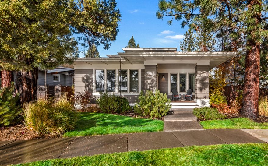 This stunning Greg Welch-built prairie-style home showcases timeless craftsmanship in the heart of Northwest Crossing, just a block from Compass Park. The main level features a spacious primary suite with a luxurious soaking tub and walk-in closet, a dedicated office, and an inviting living area with hardwood floors, a cozy gas fireplace, and elegant wood-wrapped windows. Abundant storage is seamlessly integrated throughout the home.  The kitchen is a chef's delight with GE Profile appliances & an island with bar seating. Upstairs, find two additional bedrooms and a versatile loft perfect for a second office, workout space, or play area. Step outside to enjoy the covered Trex deck with a gas hookup for your BBQ, a paver patio, and a beautifully landscaped, fenced yard. The garage offers a workbench, ceiling racks, a sink, and an extended driveway with a parking pad for extra convenience. Situated on a quiet street near shops, restaurants, schools & trails, this home is a true gem.