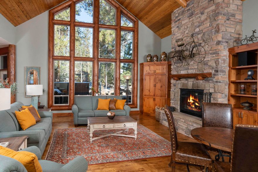 Don't miss the opportunity to own this magnificent & upscale home in Sunriver. You are greeted w/ a stunning chateau-size fireplace and cathedral window walls, creating a grand backdrop for your Sunriver Resort life! Situated on 1-1/2 lots on the north end of Sunriver, this lodge style home features 5 bedrooms, 4-1/2 baths, office, plus a large flex room and a bonus exercise area, not included in the sq footage. Details such as a spacious kitchen w/ large pantry & wine storage, stainless appliances, natural edged slab granite, abundant cabinetry & huge island. A granite wet-bar area w/ oversized spacious deck just outside & add'l paver patio area offers superb outdoor living & entertaining.  Main primary bdrm suite is nicely separated from 2 other Jr. suites; enjoy the convenience of a home office downstairs. Upstairs a 4th Jr. Suite & spacious flex room plus attic exercise area. Beautifully furnished. Newer hot tub. Landscaped w/ water feature. A/C, 3-car garage. New Roof Jan 2023.